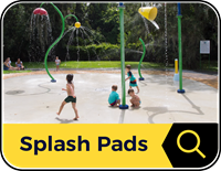 stayCoolJax_1_image splash pads button: kids playing under spray of water