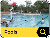 stayCoolJax_2_image pools button: children and adults swimming in pool under watchful eyes of lifeguard