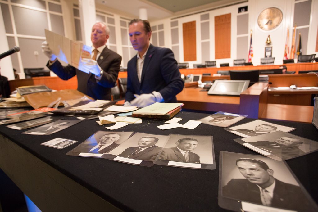 Mayor Lenny Curry and City Council President Aaron Bowman open a time capsule from the Old City Hall building in October 2018. 