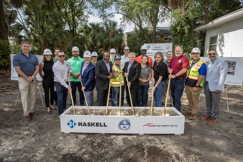 group of people with shovels