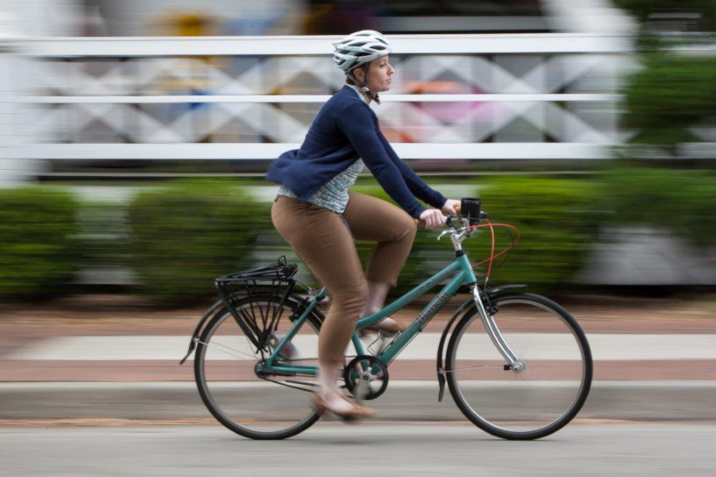 Amy Ingles bicycling to work.