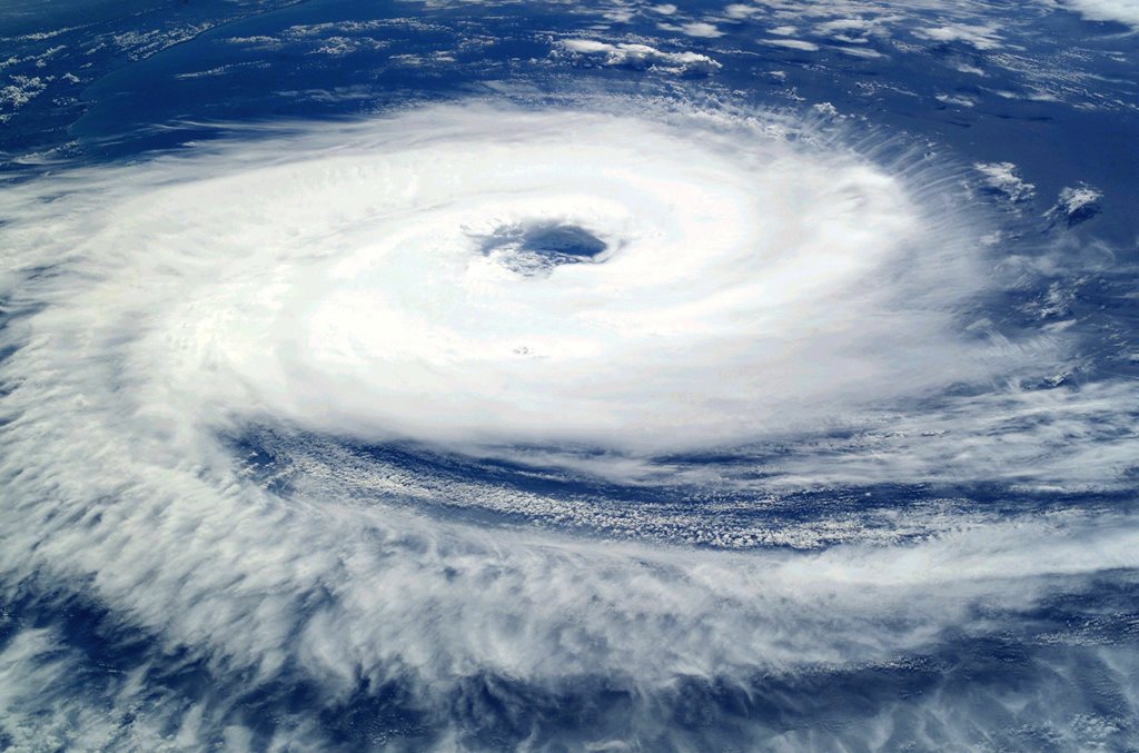 overhead view of hurricane storm over ocean