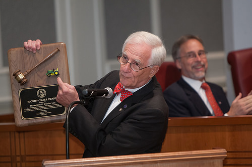 Photo of out-going Council Member Bill Gulliford displaying the 