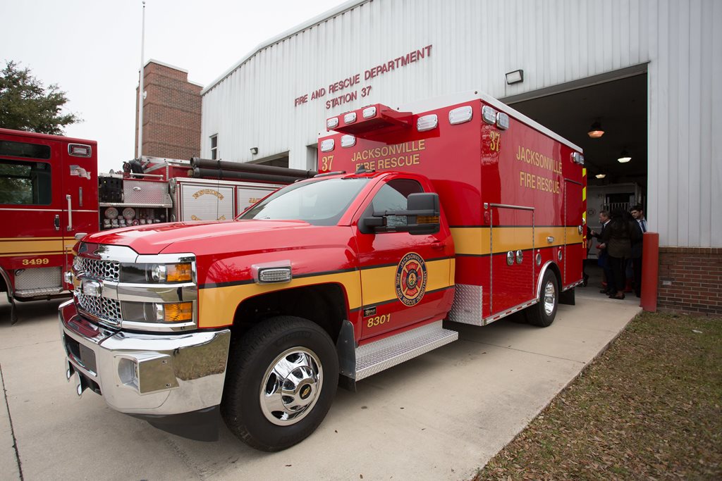 JFRD rescue truck parked at a fire station garage