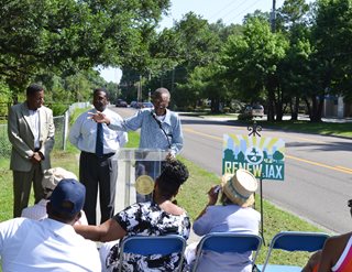 From left: Councilman Reggie Brown, Mayor Alvin Brown and Magnolia Gardens President Gadson Burgess