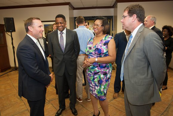 September 1, 2015 photo of Council Member Reginald Brown speaking with Mayor Lenny Curry, Representative Mia Jones, and Council President Greg Anderson at the Anheuser-Busch expansion announcement.