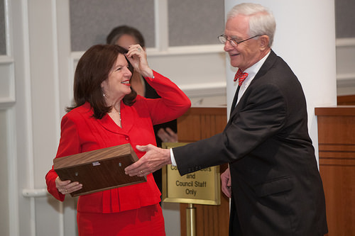 Photo of Council Member Lori Boyer receiving an award of recognition for her work, on the Task Force on the Consolidated Government, from out-going Council President Bill Gulliford, during the Council Officer Installation Ceremony, held in the Council Cham