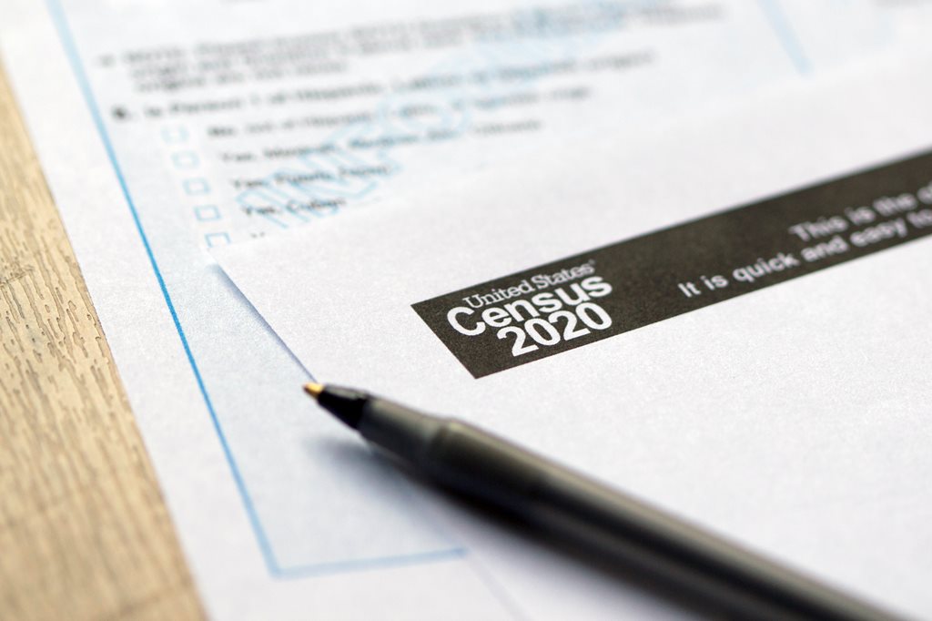 Close up on 2020 Census papers and a pen on a table