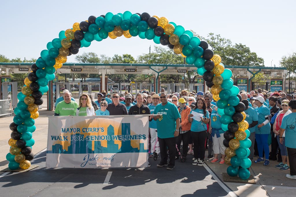 Mayor Lenny Curry joins Jacksonville seniors for a wellness walk at TIAA Bank Field