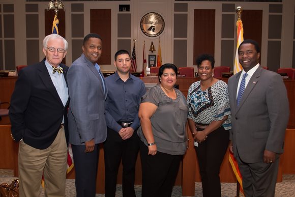 September 30, 2013 photo of Council Member Reggie Brown and Council Members Bill Gulliford and Kim Daniels and Mayor Brown with Hispanic Leadership Award recipients Daniel and Ana Valentine.