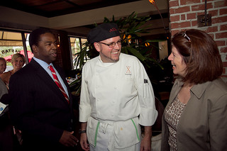 Photo of Council Member Lori Boyer and Mayor Alvin Brown speaking with a member of the San Marco business community.