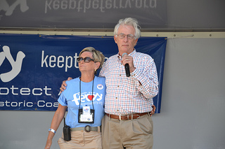 Photo of Council Vice President Bill Gulliford, addressing the audience, with St. Johns River Ferry Commissioner Elaine Brown.