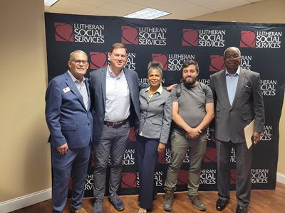 group of professionals posing for photo