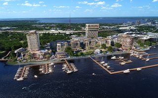 riversedge park project rendering - people enjoying grassy park spaces