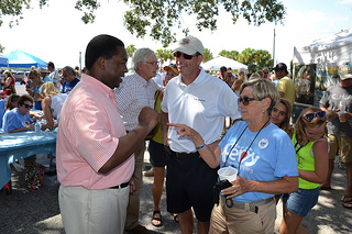 Photo of St. Johns Ferry Commissioner Elaine Brown talking with Mayor Alvin Brown at the Ferry Fest.